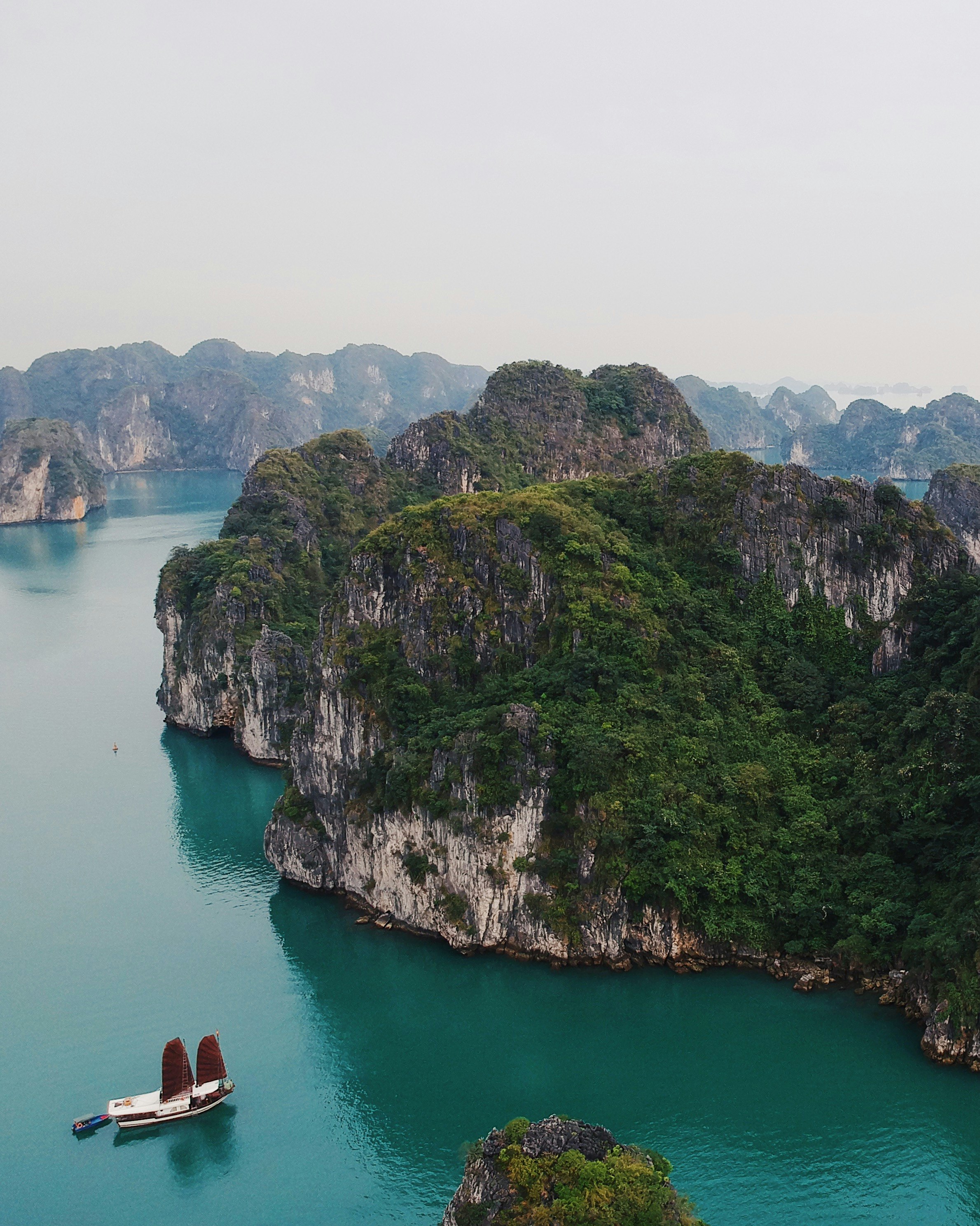 boat sailing near island